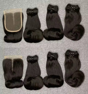 Black curled hair bundles and lace closure shown from the hair and lace sides