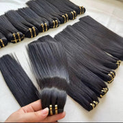 RAW Vietnamese straight hair bundles arranged with gold packaging rings