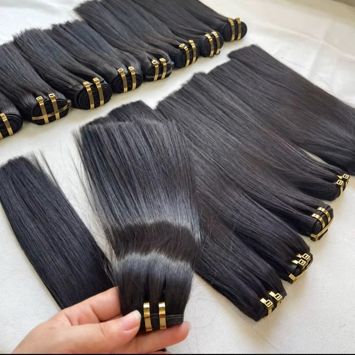 RAW Vietnamese straight hair bundles arranged with gold packaging rings