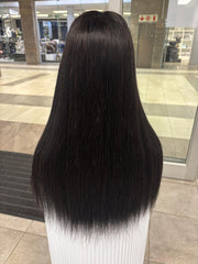 Long black straight wig, rear view on mannequin