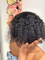Brazilian black water-wave 4×4 lace wig, back view on model