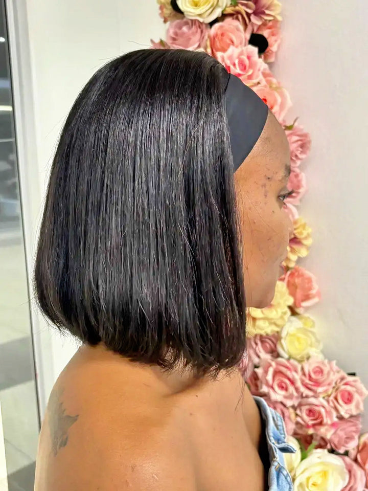 Brazilian 10-inch black straight headband wig, side view on model