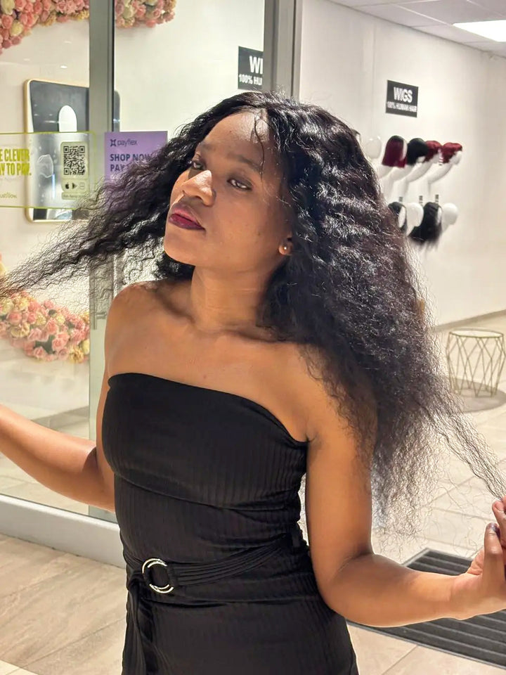 Brazilian black water-wave 4×4 lace wig, side view on model
