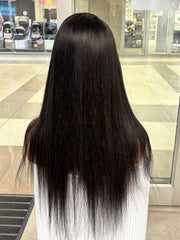 Long black straight wig, rear view on mannequin